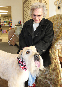 Clancy saves his owner Anges Larson from home intruders. Photo by: Brian Basham/Record