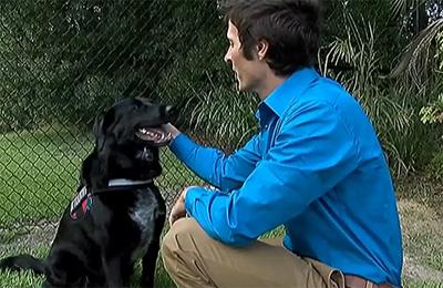 Benjamin Jordan and his hero dog Killian.