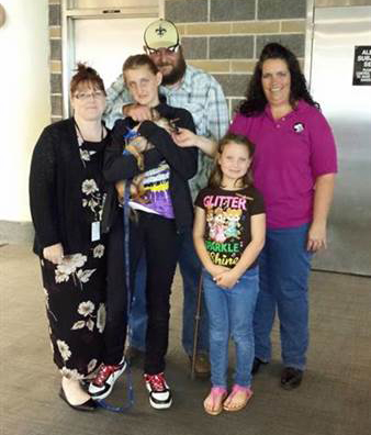 Sam reunited with his family. (Cedar Rapids Police Department)