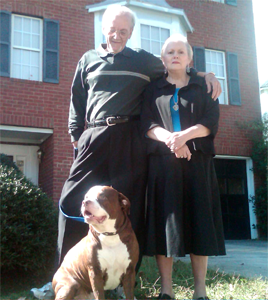 John and Gloria Benton with their hero dog Titan.